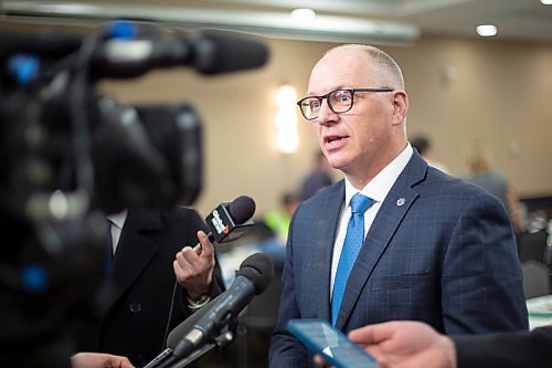 Mike Deal / Winnipeg Free Press
Winnipeg Mayor Scott Gillingham talks to the media after attending the Manitoba Heavy Construction Association&#x2019;s (MHCA) 2023 Breakfast with the Leaders series at the Holiday Inn Express Winnipeg Airport, 1740 Ellice Ave, Tuesday morning.
See Gabby story
230411 - Tuesday, April 11, 2023.