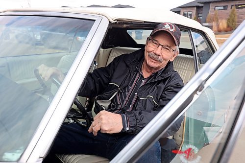 Norm Poersch sits in his 1965 Pontiac Parisienne at his home in Brandon. See story on Page A8. (Tim Smith/The Brandon Sun)