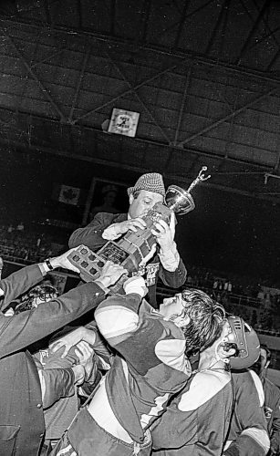 Dave Johnson / Winnipeg Free Press files
Head coach Muzz MacPherson, wearing a fedora, lifts the Centennial Cup up while being hoisted onto the shoulders of his team.
On Monday, May 14, 1973,&#xa0;the Portage Terriers clinched the Centennial Cup, beating the Pembroke Lumber Kings (Ont.) 4-2 in the fifth game of the series at Winnipeg Arena.
See Mike Sawatzky story