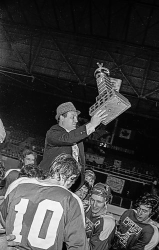 Dave Johnson / Winnipeg Free Press files
Head coach Muzz MacPherson, wearing a fedora, lifts the Centennial Cup up while being hoisted onto the shoulders of his team.
On Monday, May 14, 1973,&#xa0;the Portage Terriers clinched the Centennial Cup, beating the Pembroke Lumber Kings (Ont.) 4-2 in the fifth game of the series at Winnipeg Arena.
See Mike Sawatzky story