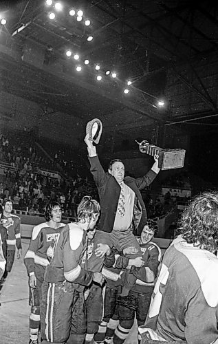 Dave Johnson / Winnipeg Free Press files
Head coach Muzz MacPherson, waving his fedora, lifts the Centennial Cup up while being hoisted onto the shoulders of his team.
On Monday, May 14, 1973,&#xa0;the Portage Terriers clinched the Centennial Cup, beating the Pembroke Lumber Kings (Ont.) 4-2 in the fifth game of the series at Winnipeg Arena.
See Mike Sawatzky story