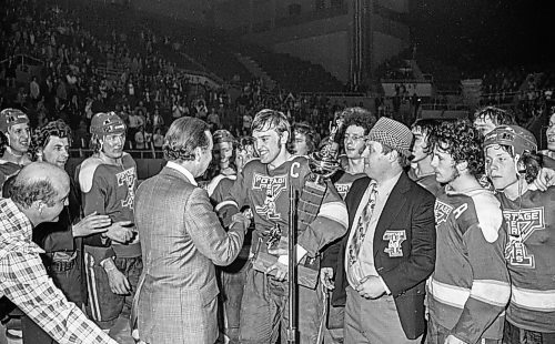 Dave Johnson / Winnipeg Free Press files
Portage captain, Grant Farncombe, is handed the Centennial Cup while surrounded by his team mates and head coach Muzz MacPherson (wearing a fedora).
On Monday, May 14, 1973,&#xa0;the Portage Terriers clinched the Centennial Cup, beating the Pembroke Lumber Kings (Ont.) 4-2 in the fifth game of the series at Winnipeg Arena.
See Mike Sawatzky story