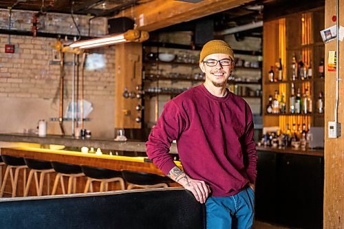 MIKAELA MACKENZIE / WINNIPEG FREE PRESS

Dylan Pereira, owner of Vertical Adventures, poses for a photo in their new location (which is a coffee shop, bar, and soon-to-be climbing space) in the Exchange District in Winnipeg on Thursday, April 20, 2023. For Gabby story.

Winnipeg Free Press 2023.