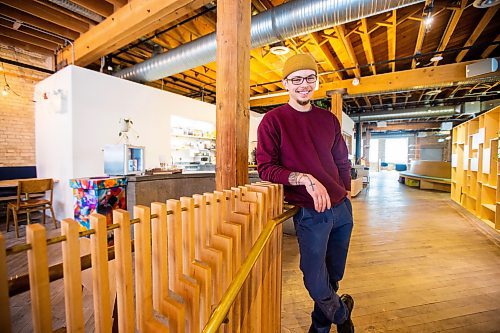 MIKAELA MACKENZIE / WINNIPEG FREE PRESS

Dylan Pereira, owner of Vertical Adventures, poses for a photo in their new location (which is a coffee shop, bar, and soon-to-be climbing space) in the Exchange District in Winnipeg on Thursday, April 20, 2023. For Gabby story.

Winnipeg Free Press 2023.