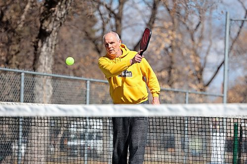 Claude Pellerin with the Brandon Pickleball Club plays a match with friends at the Stanley Park courts Friday morning. (Tim Smith/The Brandon Sun)