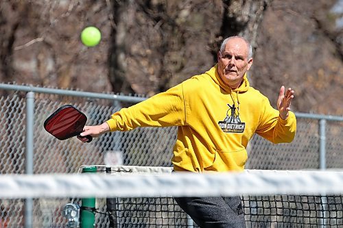 Claude Pellerin with the Brandon Pickleball Club plays a match with friends at the Stanley Park courts Friday morning. (Tim Smith/The Brandon Sun)