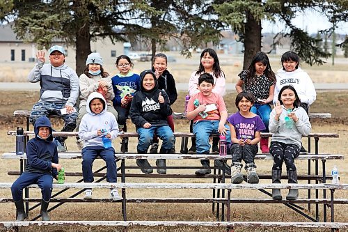 280423
Grade three students from Sioux Valley Elementary School take a break on a set of bleachers at the pow wow grounds during a walk to learn about structures in the community on Friday.  (Tim Smith/The Brandon Sun)