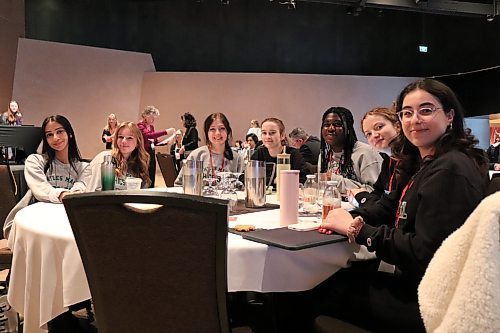 (From left) Gagan Sahota, Sarah Madsen, Nyla Hicock, Zoe Judson, Precious Ola-Joseph, Grace Wall and Khava Amir represented Miles Macdonell Collegiate during the Canadian High School Ethics Bowl at the Canadian Museum for Human Rights on Saturday, April 29, 2023. (Tyler Searle / Winnipeg Free Press) 