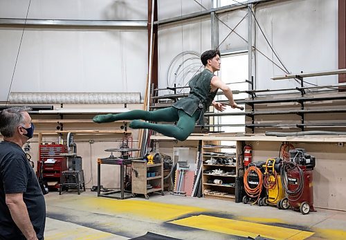 JESSICA LEE / WINNIPEG FREE PRESS

Royal Winnipeg Ballet dancer Liam Saito, who plays Peter Pan in RWB&#x2019;s upcoming production of Peter Pan, practices flying April 29, 2023 in a warehouse in the Exchange District in preparation for his role. Harold Christensen (left) the flying expert, coaches Saito.


Reporter: Jen Zoratti