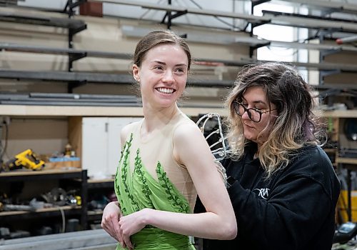 JESSICA LEE / WINNIPEG FREE PRESS

Royal Winnipeg Ballet dancer Amanda Solheim, who plays Tinkerbell in RWB&#x2019;s upcoming production of Peter Pan, is photographed April 29, 2023 in a warehouse in the Exchange District where they are practicing flying. Solheim is getting her wings pinned on by Diana Miller, who works in RWB&#x2019;s wardrobe department.

Reporter: Jen Zoratti