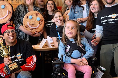 Mike Sudoma/Winnipeg Free Press
A group of media personalities pose with Smile Cookie Ambassador Smile Cookie Ambassador, Braelynn Bodman during a media cookie decorating contest to kick off Smile Cookie Week Monday morning
May 1, 2023