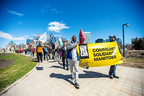 MIKAELA MACKENZIE / WINNIPEG FREE PRESS
 
Albert Boakye (left) and Evandro Andrade lead the march from the Union Centre to the Legislature on May Day, an important day for union activists, in Winnipeg on Monday, May 1, 2023. One-third of PSAC members are currently still on strike.

Winnipeg Free Press 2023.