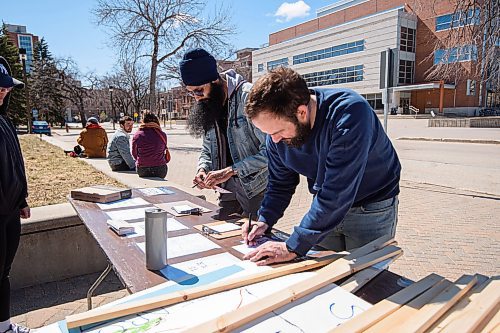 Mike Sudoma/Winnipeg Free Press
Walkout attendees write letters to MLA&#x2019;s and make signs prior to a walkout rally held at the University of Manitoba Monday afternoon
May 1, 2023