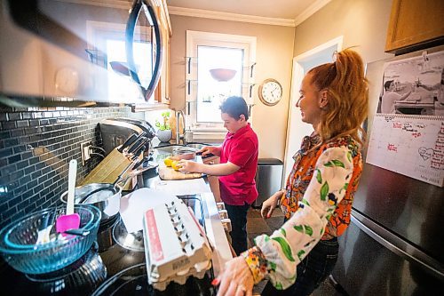 MIKAELA MACKENZIE / WINNIPEG FREE PRESS
 
Jack Taylor, 10, makes lemon curd for mini cheesecakes with his mom, Meghan, in Winnipeg on Monday, May 1, 2023. For Eva story.

Winnipeg Free Press 2023.