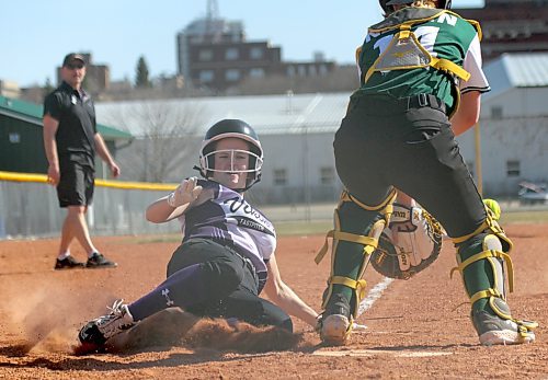 Avery Birch slides home safely for an inside-the-park home run to lead the Vincent Massey Vikings past the Neelin Spartans in Brandon High School Softball League action at Ashley Neufeld Softball Complex on Tuesday. (Thomas Friesen/The Brandon Sun)
