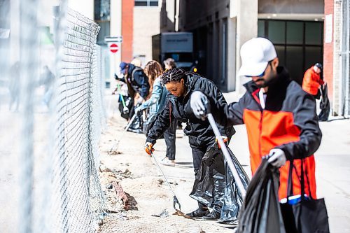 MIKAELA MACKENZIE / WINNIPEG FREE PRESS
 
Doris Ozigbo picks up garbage at the Downtown Winnipeg BIZ annual community cleanup in Winnipeg on Tuesday, May 2, 2023. Standup.

Winnipeg Free Press 2023.