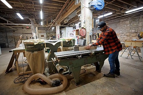 Mike Deal / Winnipeg Free Press 
Mike Liambis, owner of Nomadic Designs, gets busy in his workshop at 740 Dufferin Avenue. Liambis founded the business in 2020, after injury forced a sudden end to his 10-year hockey career.