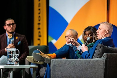 MIKAELA MACKENZIE / WINNIPEG FREE PRESS
 
Noah Wilson (left), Peter Nunoda, Oyindamola Alaka, and Jason Gill speak in a panel discussion at the second-ever CODE conference, an event held by the Winnipeg Chamber of Commerce which promotes diversity in the workplace, at the RBC Convention Centre in Winnipeg on Wednesday, May 3, 2023. For Gabby story.

Winnipeg Free Press 2023.