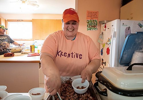 JESSICA LEE / WINNIPEG FREE PRESS

Meredith Robinson puts ham into soup bowls May 3, 2023 at the kreative Kitchen at St. Thomas Anglican in Weston, where food insecure community members gather to pick up hot meals and a hamper on Wednesday nights.

Reporter: John Longhurst