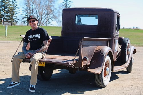 Brandon's Curt Stauffer sits on the tailgate of his 1932 Truck Model B with its flathead V8 engine and three speed manual transmission at Dinsdale Park on Thursday. (Photos by Michele McDougall/The Brandon Sun)