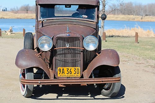 Curt Stauffer is in the driver's seat of his 1932 Truck Model B with its flathead V8 engine and three speed manual transmission at Dinsdale Park on Thursday. (Michele McDougall, The Brandon Sun)