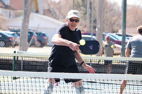 Vince Paskewitz returns a serve from a fellow member of the Brandon Pickleball Club during a Thursday morning session at Stanley Park. (Kyle Darbyson/The Brandon Sun)