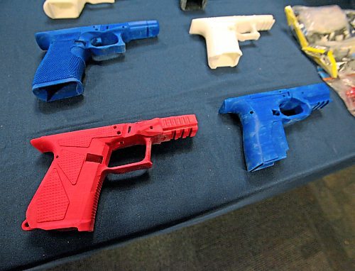3D-printed Glock-style pistol lower receivers, which police allege were assembled into functioning guns, seized in March. ERIK PINDERA/WINNIPEG FREE PRESS