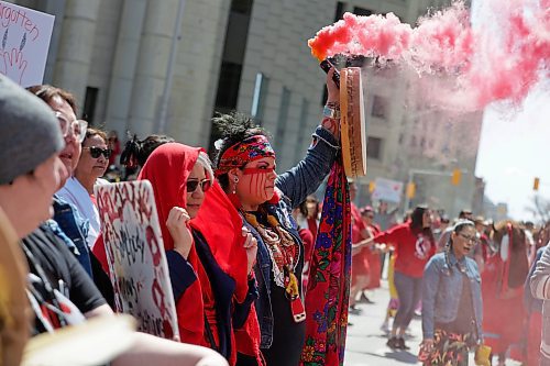 RUTH BONNEVILLE / WINNIPEG FREE PRESS 

LOCAL - MMIWG 

Organizers planned a round dance at Portage and Main at noon to honour the National Day of Awareness of Missing and Murdered Indigenous Women and Girls and Two-Spirited Peoples (MMIWG2S+).  The gathering moved into a march to the Forks after drumming event. 
 
May 5th,, 2023