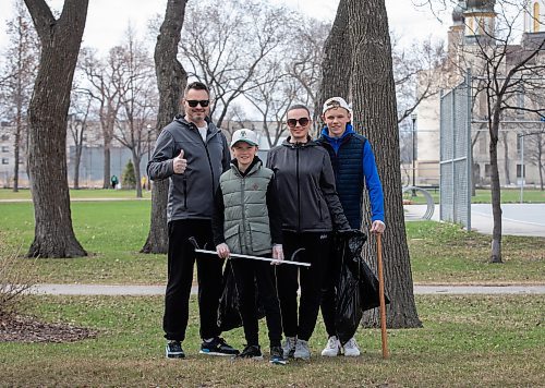 JESSICA LEE / WINNIPEG FREE PRESS

From left to right: Ukrainians Andrii, Marko Tanya, and Arsen clean up St. John&#x2019;s Park May 6, 2023 as part of a community clean-up to give back to Manitobans who&#x2019;ve welcomed refugees fleeing from the war.

Stand up