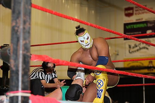 Canadian Wrestling's Elite champion Mentallo puts Shaun Martens in a "half Boston crab" in front of a bustling Rivers crowd on Saturday evening. (Kyle Darbyson/The Brandon Sun)