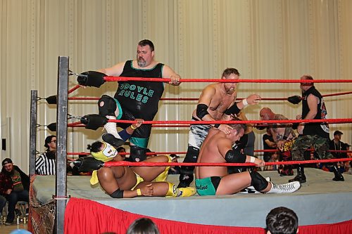 (Boston Bruiser) Kevin O'Doyle (left) interrupts the Canadian Wrestling's Elite championship match between Mentallo and Shaun Martens, resulting in a disqualification for Martens and an unruly brawl between most of the CWE locker room. (Kyle Darbyson/The Brandon Sun)