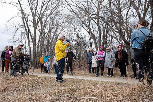 BROOK JONES / WINNIPEG FREE PRESS
Jean-Pierre Brunet, who is a founding member of Save our Seine, talks to people about local St. Boniface history during a guided walk along the Seine River in Lagimodi&#xe8;re-Gaboury Park by members of Save our Seine. Organizers say 80 people registered for the Seine River Trail Jane's Walk in Winnipeg, Man., during the afternoon of Sunday, May 7, 2023. The citizen-led walking conversations inspired by citizen activist Jane Jacobs take place on the first weekend in May every year. Jane's Walk festivals take place in hundreds of cities around the world with the goal of encouraging people to share stories about their neighbourhoods and discover unseen aspects of their communities. 
