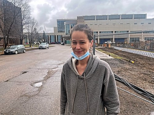 Brandonite Jessica Onofriechuk at 32 years old is a mother of two, and wears a mask as she leaves the Brandon Regional Health Centre after receiving treatment. (Michele McDougall, The Brandon Sun) 