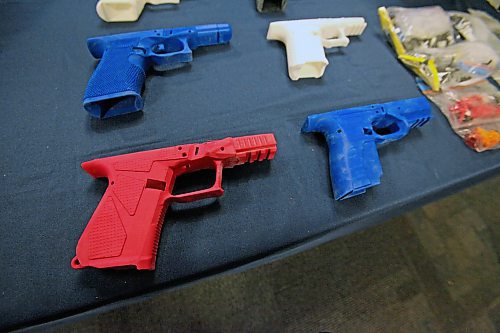 3D-printed Glock-style pistol lower receivers, which police allege were assembled into functioning guns, seized in March. ERIK PINDERA/WINNIPEG FREE PRESS