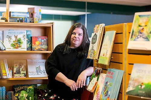 MIKAELA MACKENZIE / WINNIPEG FREE PRESS
 
Local children&#x2019;s author Anna Lazowski poses for a photo with her new book, Dark Cloud, at McNally Robinson in Winnipeg on Monday, May 8, 2023. For Jen story.

Winnipeg Free Press 2023.