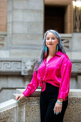 MIKAELA MACKENZIE / WINNIPEG FREE PRESS
 
NDP MLA Nahanni Fontaine poses for a photo wearing Women Helping Women Beadwork earrings at the Manitoba Legislative Building in Winnipeg on Monday, May 8, 2023. For Kevin story.

Winnipeg Free Press 2023.