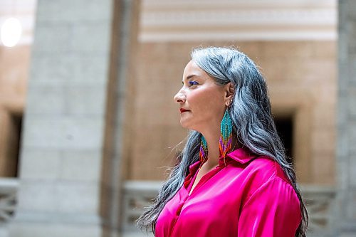 MIKAELA MACKENZIE / WINNIPEG FREE PRESS
 
NDP MLA Nahanni Fontaine poses for a photo wearing Women Helping Women Beadwork earrings at the Manitoba Legislative Building in Winnipeg on Monday, May 8, 2023. For Kevin story.

Winnipeg Free Press 2023.