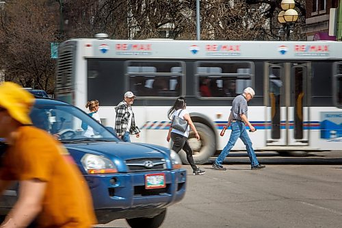 Mike Deal / Winnipeg Free Press
People cross the intersections at River and Osborne Wednesday afternoon. The Osborne Village BIZ has proposed a new plan suggesting the city add a pedestrian scramble &#x2013; which stops all traffic for a period to let all pedestrians cross in all directions at the same time, at the intersection.
See Joyanne story
230510 - Wednesday, May 10, 2023.