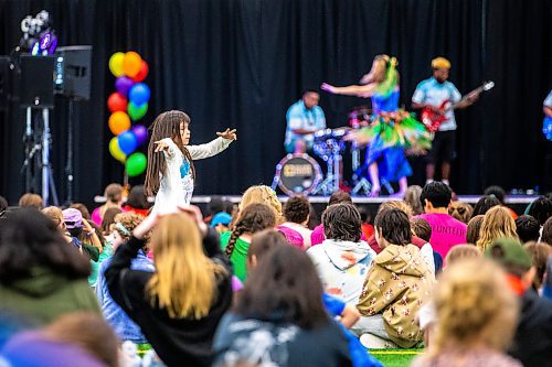 MIKAELA MACKENZIE / WINNIPEG FREE PRESS
 
Elizabeth Bruelle, grade one student at Luxton School, dances as Island Breeze perform Hawaiian dance at Sharing Dance day (put on by the Royal Winnipeg Ballet) at the Axworthy Health &amp; RecPlex in Winnipeg on Wednesday, May 10, 2023.  Standup.

Winnipeg Free Press 2023.