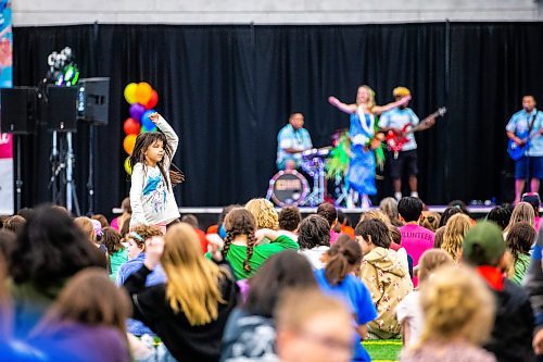 MIKAELA MACKENZIE / WINNIPEG FREE PRESS
 
Elizabeth Bruelle, grade one student at Luxton School, dances as Island Breeze perform Hawaiian dance at Sharing Dance day (put on by the Royal Winnipeg Ballet) at the Axworthy Health &amp; RecPlex in Winnipeg on Wednesday, May 10, 2023.  Standup.

Winnipeg Free Press 2023.