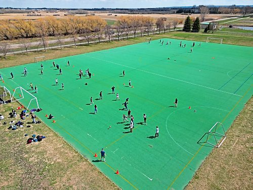 10052023
Grade nine students (foreground) play five-on-five games of soccer at Crocus Plains Regional Secondary School during physical education class on a hot Wednesday. (Tim Smith/The Brandon Sun)default