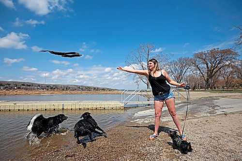 10052023
Jen Shoemaker of Minnedosa throws a stick into Minnedosa Lake for her dogs Finley and Luna while letting them enjoy the beautiful day along with other family dogs Rocky and Shadow (not shown) on Wednesday.
(Tim Smith/The Brandon Sun)