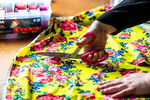 Photos by MIKAELA MACKENZIE / WINNIPEG FREE PRESS 
Marlena Muir, founder of Métis Superstar Designs, works on a skirt in her home.