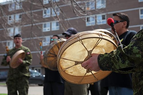 Drummers perform a song prior to the Moose Hide Campaign Walk to End Violence in Brandon on Thursday. The event, which called for an end to violence against women and children, was organized by 
the Brandon Urban Aboriginal People’s Council and Assiniboine Community College. The Moose Hide Campaign began in B.C. as an Indigenous-led initiative to engage men and boys in ending violence toward women and children. (Tim Smith/The Brandon Sun)