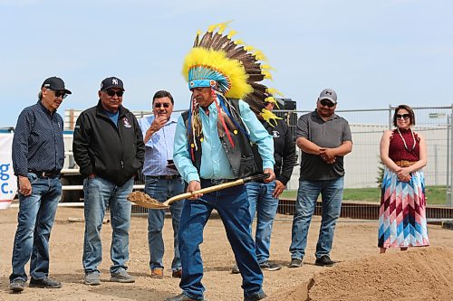 Waywayseecappo First Nation Chief Murray Clearsky takes part in a Thursday afternoon sod turning ceremony at the site of the community's new conference centre located just north of Brandon. Murray and other Waywayseecappo councillors mixed dirt together with tobacco to ensure that the construction of this building will go smoothly. (Kyle Darbyson/The Brandon Sun)