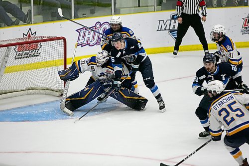 BROOK JONES / WINNIPEG FREE PRESS
The Steinbach Pistons face the Collingwood Blues in Centennial Cup action at Stride Place in Portage la Prairie, Man., Thursday, May 11, 2023.. The 51st edition of Canada's National Junior A Championship runs May 11 to 21. Pictured: Pistons forward Nick Mikan gets tangled up with Blues defenceman Ayden Dooley and Blues goalie Noah Pak during first period action. 