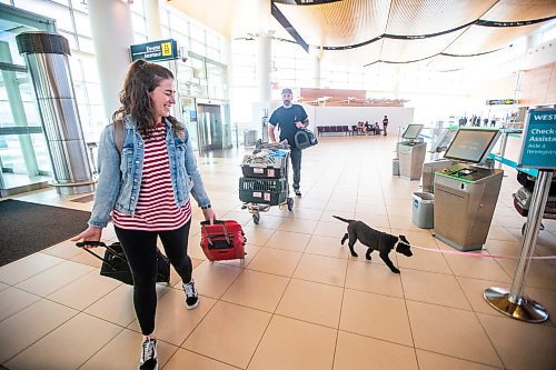 MIKAELA MACKENZIE / WINNIPEG FREE PRESS
 
Eva Wasney and her partner, Neal Leithead, transport adoptable cats and puppies to Toronto for K9 Advocates Manitoba at the airport in Winnipeg on Wednesday, May 3, 2023. For Eva story.

Winnipeg Free Press 2023.