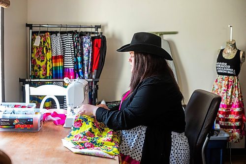 MIKAELA MACKENZIE / WINNIPEG FREE PRESS
 
Marlena Muir, founder of Metis Superstar Designs, works on a skirt in her home where she makes contemporary ribbon skirts in Selkirk on Wednesday, May 10, 2023. For Dave story.

Winnipeg Free Press 2023.