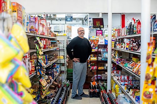 MIKAELA MACKENZIE / WINNIPEG FREE PRESS
 
Monissh Kapoor, owner of Barchet's Grocery, poses for a photo in his shop in Winnipeg on Thursday, May 11, 2023. Monissh is selling the corner store because of health issues. For Gabby story.

Winnipeg Free Press 2023.