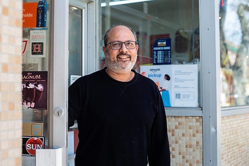 MIKAELA MACKENZIE / WINNIPEG FREE PRESS
 
Monissh Kapoor, owner of Barchet's Grocery, poses for a photo in front of his shop in Winnipeg on Thursday, May 11, 2023. Monissh is selling the corner store because of health issues. For Gabby story.

Winnipeg Free Press 2023.